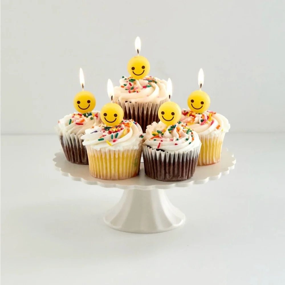 UO Happy face cake candle set